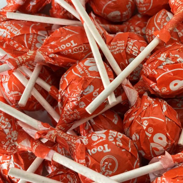 Bulk bin of Orange Tootsie Pops