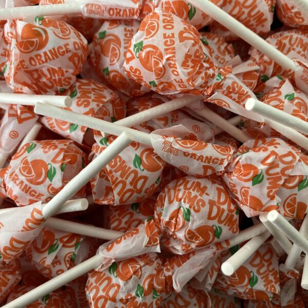 Bulk bin of Orange Dum Dums