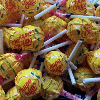 Bulk bin of Lemon Yellow Chupa Chups lollipops